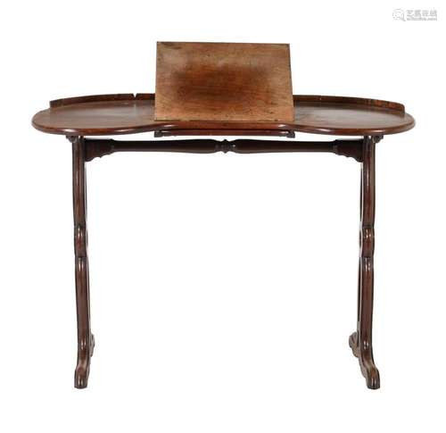 A mahogany kidney shaped writing table