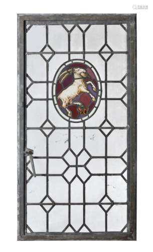 A group of twelve stained glass and leaded window panels