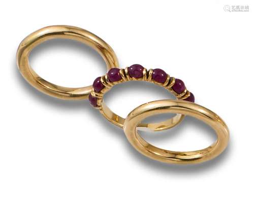 THREE GOLD AND RUBY CABOCHON RINGS