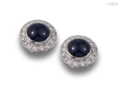 Platinum earrings with sapphire cabochon