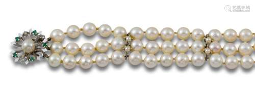 Bracelet, 1960s, platinum cultured pearls. Flower clasp with...