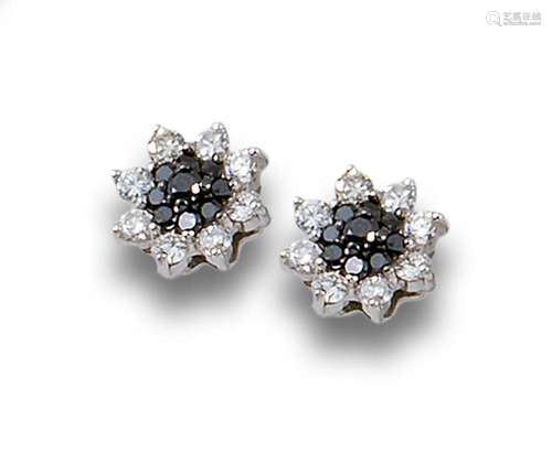 18kt white gold flower earrings with a centre of black diamo...