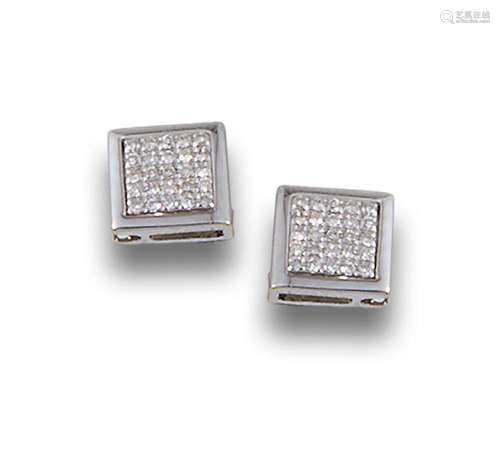 18kt white gold earrings set with brilliant-cut diamonds.