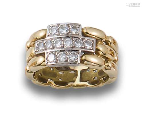 Ring, 1980s, in 18kt yellow gold, with the front in white go...