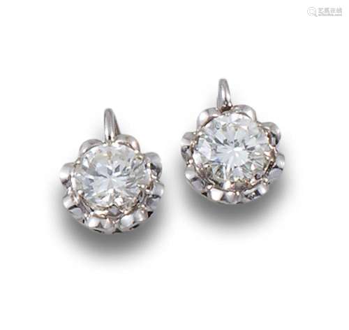 Diamond earrings in platinum.