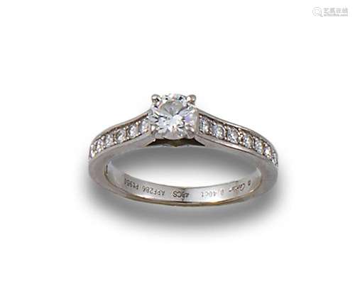 CARTIER solitaire ring in platinum with diamond centre.