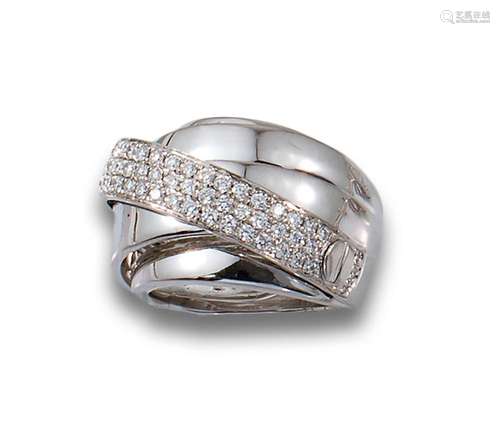 18kt white gold bombé ring with brilliant-cut diamonds.