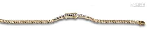 Bracelet in 14 kt. yellow gold with a brilliant-cut diamond ...