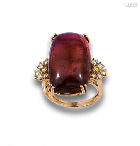 18kt. rose gold ring comprising a central tourmaline cabocho...