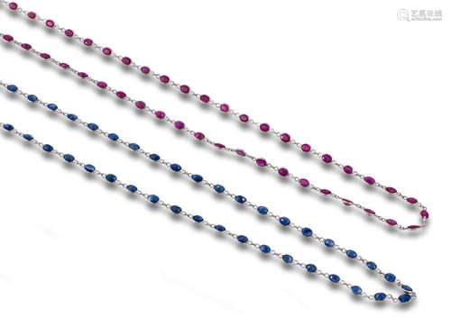 Set of two 18kt white gold chains with ruby and sapphire.