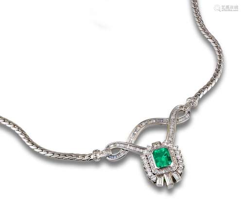 18kt white gold choker, centre cut emerald,with diamonds.