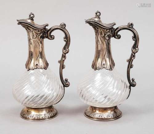 Pair of carafes with silver mount,