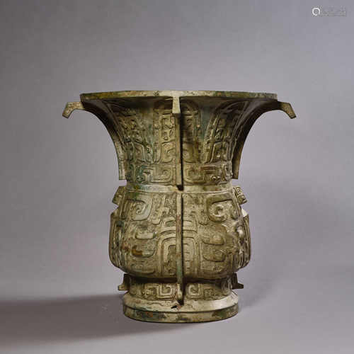 A Chinese Bronze Taotie Mask Vessel Zun