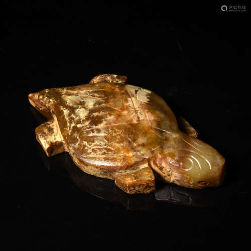 A Carved Brownish Jade Turtle