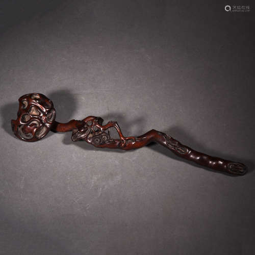 A Carved Sandalwood Plum Blossom Ruyi Scepter