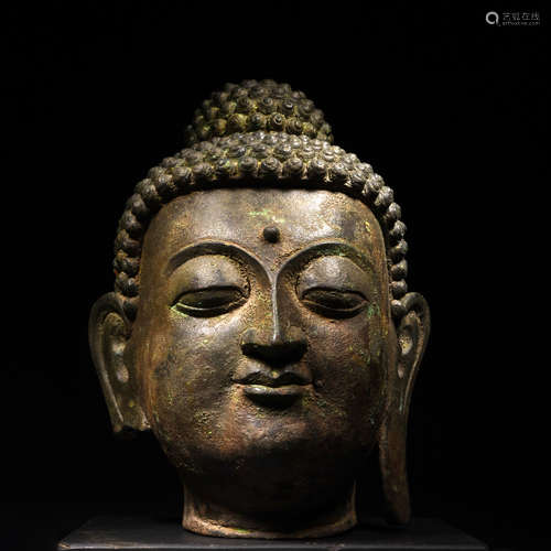 A Cast Bronze Head of Buddha