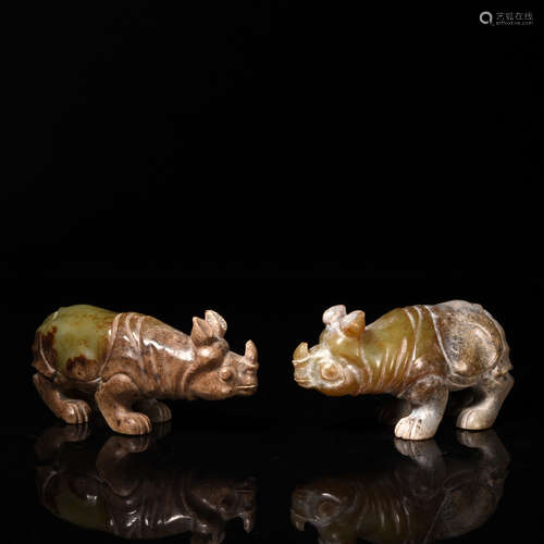 A Pair of Celadon Jade Rhinoceros