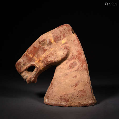 A Painted Pottery Head of Horse