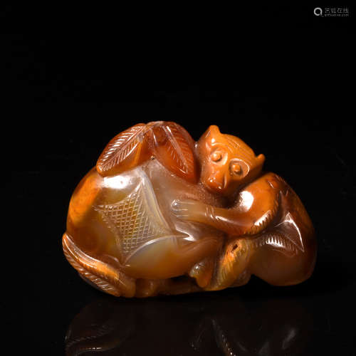 A Carved Agate Monkey Ornament