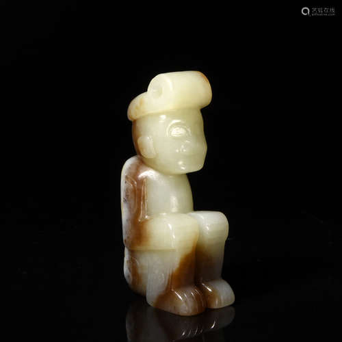 A Carved Celadon Jade Figure