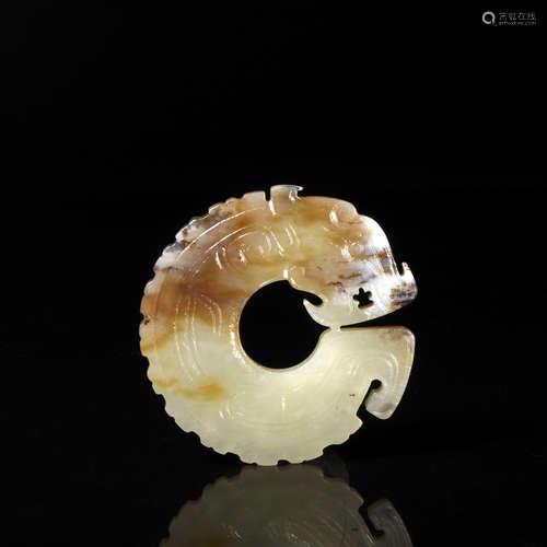 A Carved Brownish Jade Chi Tiger Pendant