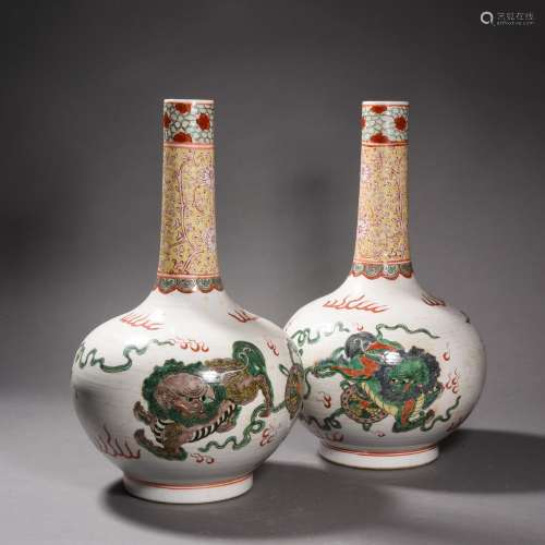 A Pair of Wucai Glaze Lion Bottle Vases