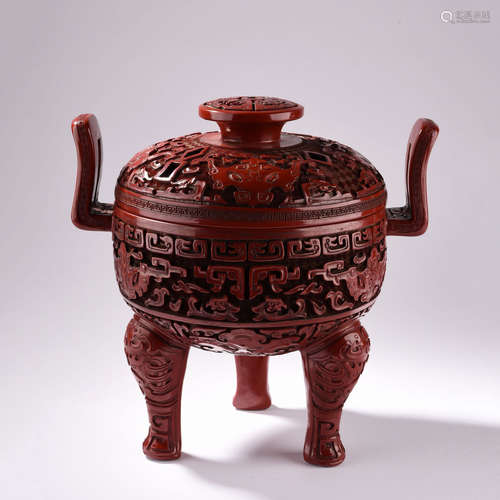 A Carved Cinnabar Lacquer Tripod Censer