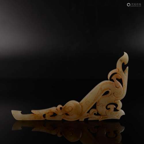 A Carved Russet Jade Dragon Pendant