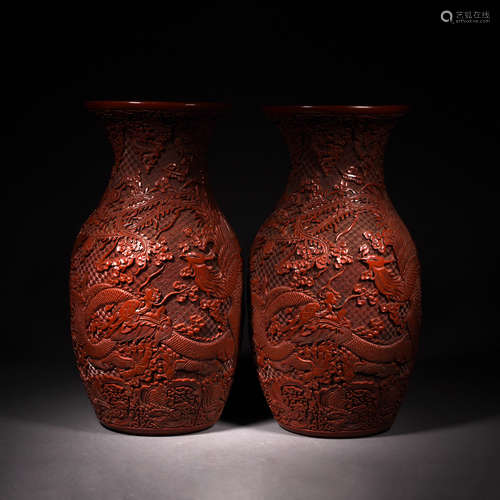 A Pair of Cinnabar Lacquer Dragon and Phoenix Vases