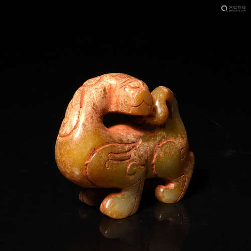 A Carved Brownish Jade Mythical Beast