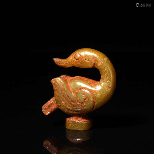 A Carved Brownish Jade Duck