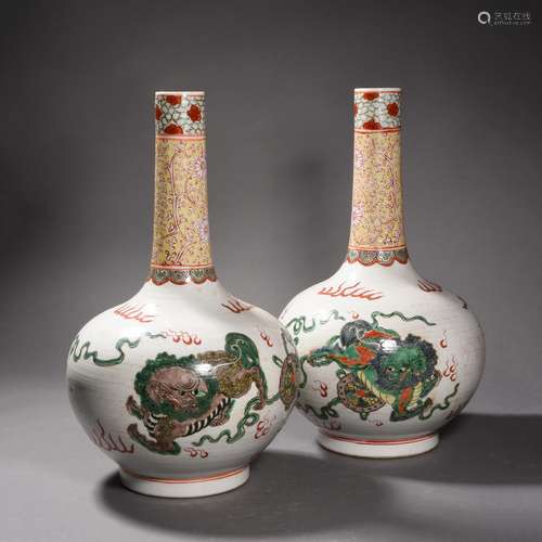 A Pair of Wucai Glaze Lion Bottle Vases