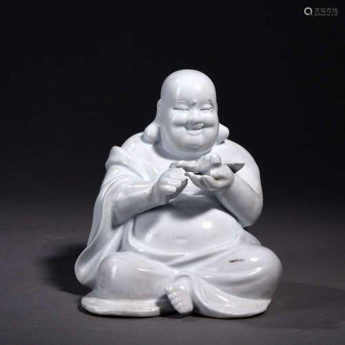 A Carved White Glaze Figure of Maitreya