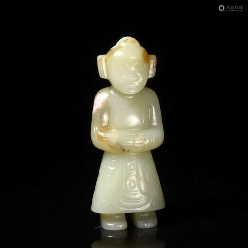 A Carved Celadon Jade Figure