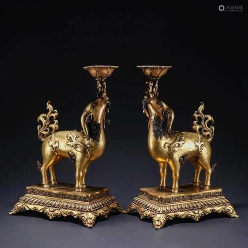 PAIR OF GILT BRONZE RAM AND LINGZHI CANDLESTICKS