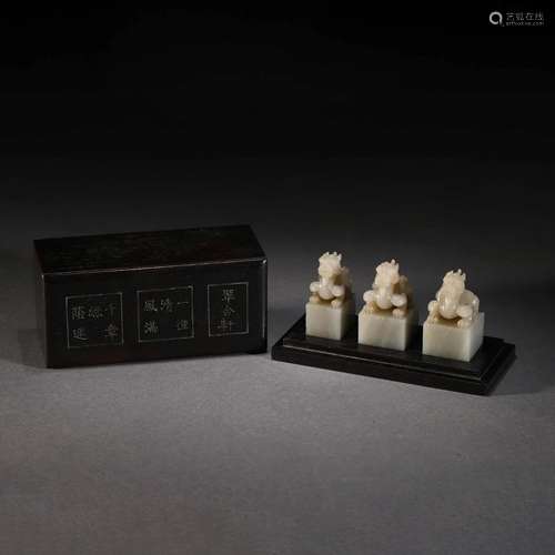 SET OF THREE STONE SEALS WITH SANDALWOOD BOX