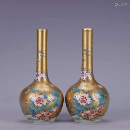 PAIR OF FAMILLE ROSE FLORAL BOTTLE VASES