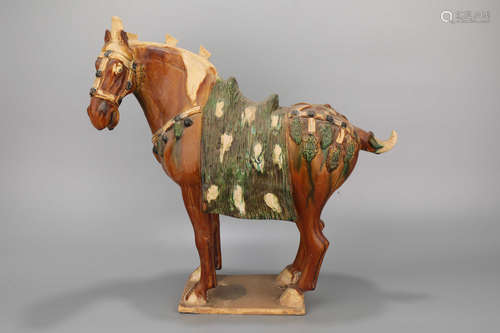 A Tang Three Colored Porcelain Horse Figure