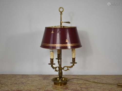 Lampe dite bouillotte en bronze doré et tôle rouge éclairant...