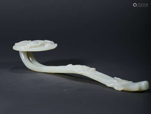 A CARVED WHITE JADE ‘LOTUS’ RUYI SCEPTER