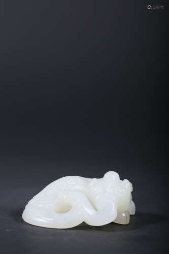 A CARVED WHITE JADE FISH-DRAGON,QING DYNASTY