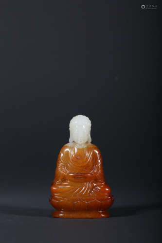 A CARVED WHITE JADE FIGURE OF BUDDHA,QING DYNASTY
