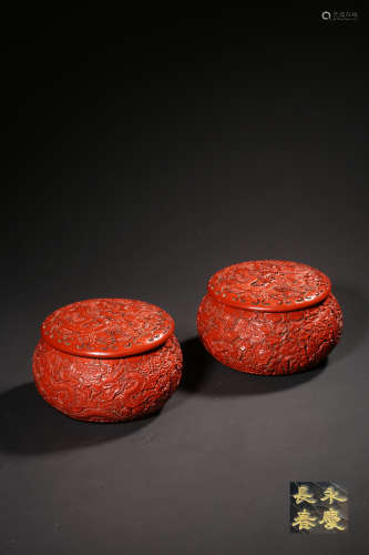 A PAIR OF CINNABAR LACQUER ‘CLOUD’BOX AND COVER, QING DYNAST...
