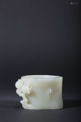 A CARVED WHITE JADE BRUSHPOT,QING DYNASTY