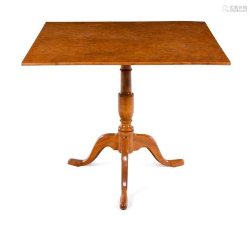 A Northern European Burled Birch Tilt-Top Table