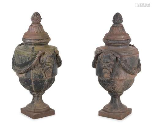 A Pair of Cast Iron Covered Garden Urns