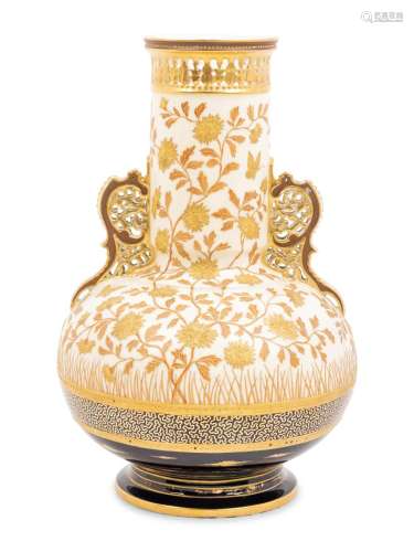 An Aesthetic Movement Gilt Decorated Earthenware Vase