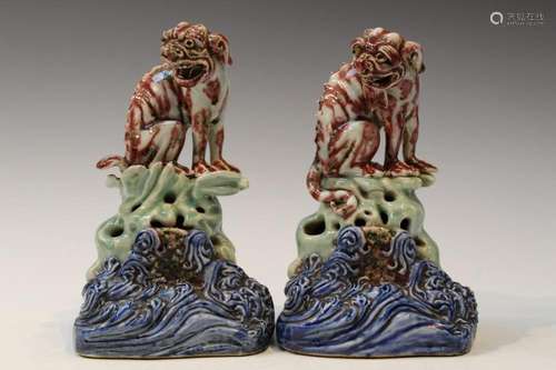 Two Chinese Underglaze Red Mythical Dog Statues