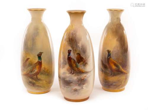 Three Royal Worcester oviform vases with slender necks, each...