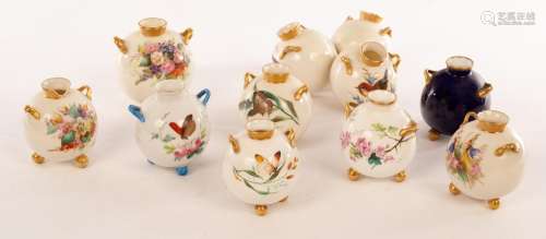 Eight Royal Worcester spherical cauldron vases,